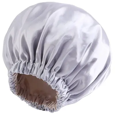Bonnet placed on a pillow to show how it stays in place during sleep