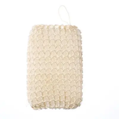 Sisal bath ball in a hotel amenity tray with other natural bath items