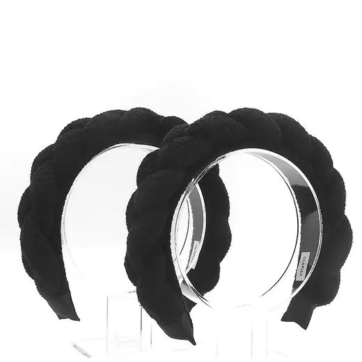 Handmade terry cloth twist sponge headband laid flat showing the fabric and sponge core