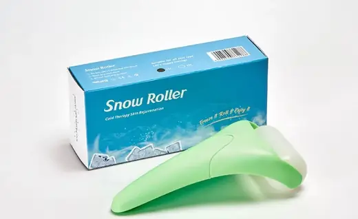 Metal ice roller for skin cooling with smooth polished surface and ergonomic handle