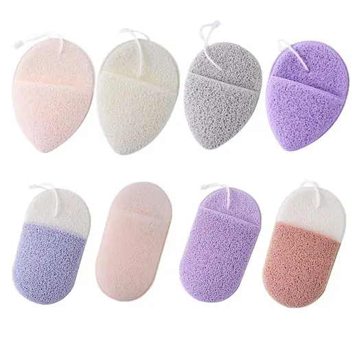 Two konjac facial sponges laid flat with visible honeycomb pore structure
