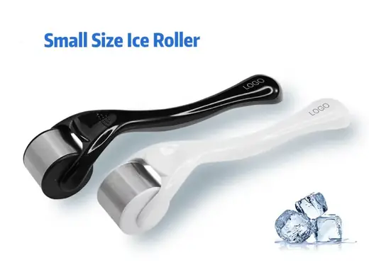 Mini stainless steel face ice roller laid on a white surface