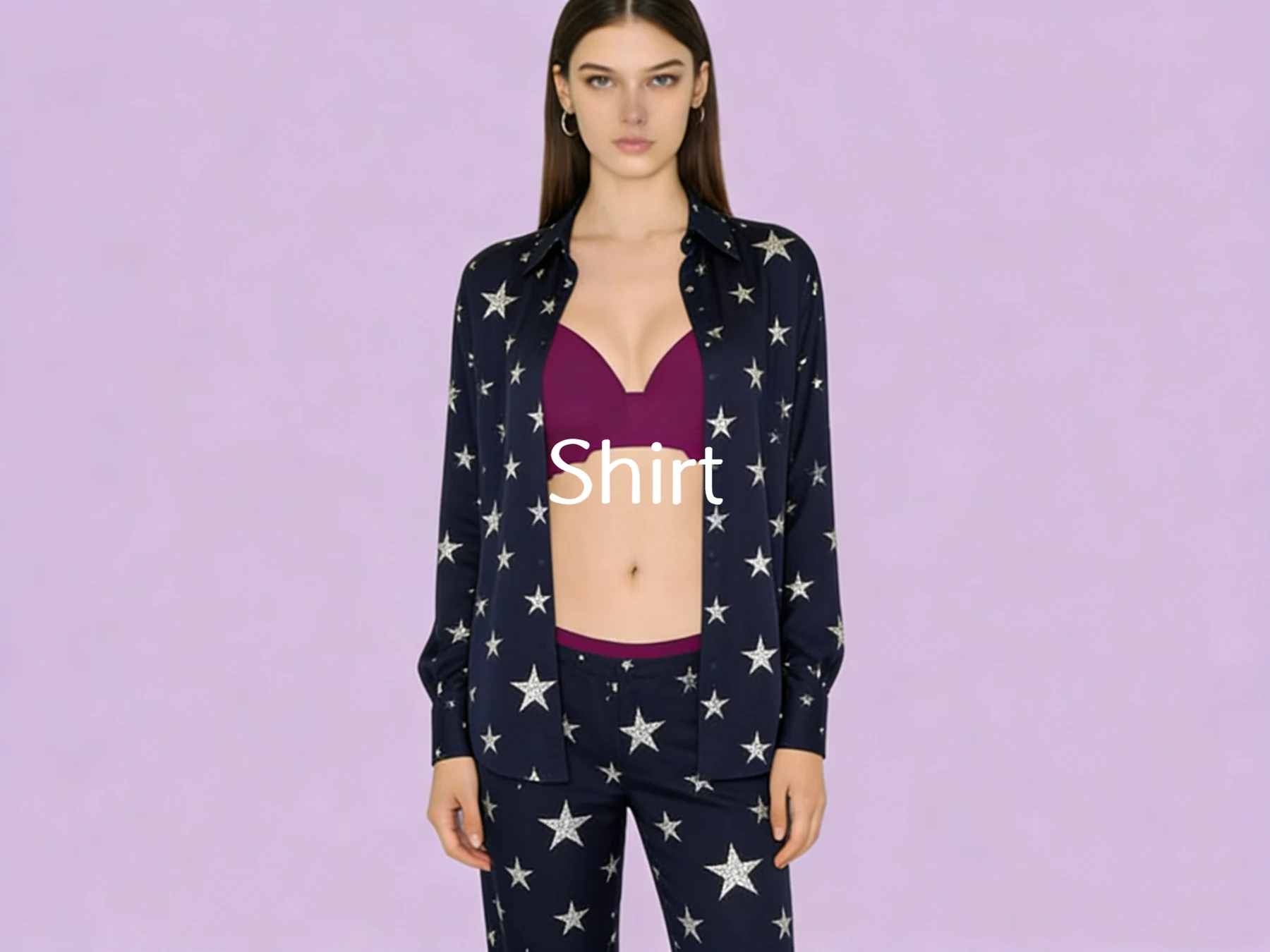 Navy star print shirt and trousers on a lavender studio backdrop
