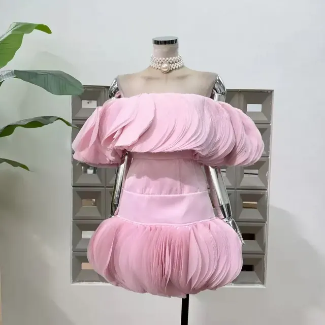 Pink chiffon off shoulder dress with petal ruffles and a bubble hem
