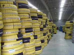 Stacked truck tyres in the Kerns Group warehouse before container loading