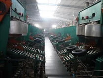 Tyre curing press line in production