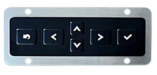 Backlit stainless steel keyboard illuminated in a dark environment