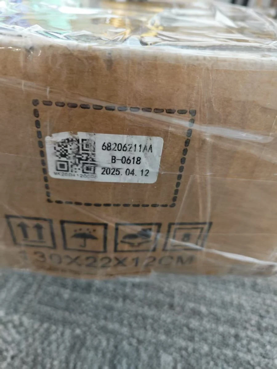 Labelled and wrapped carton prepared for shipment
