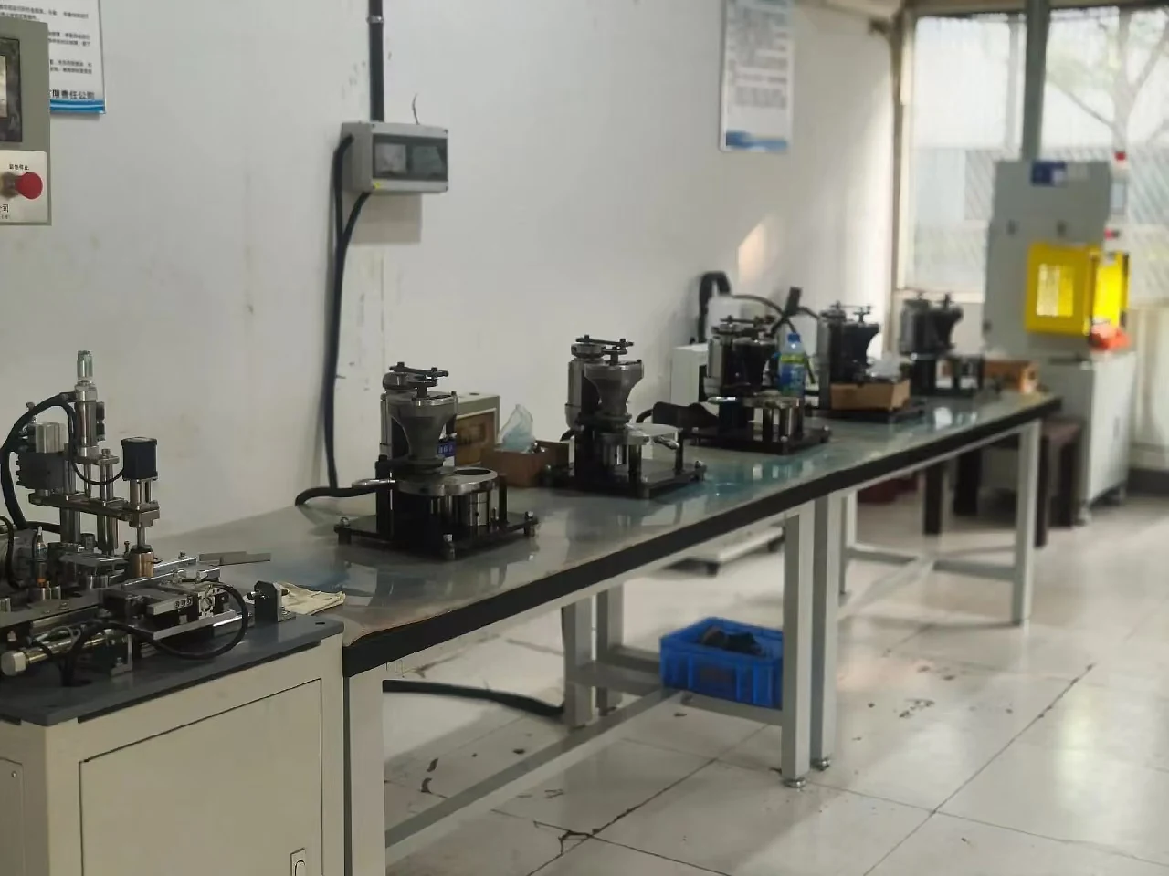 Inspection bench with test fixtures used for dimensional and balance checks