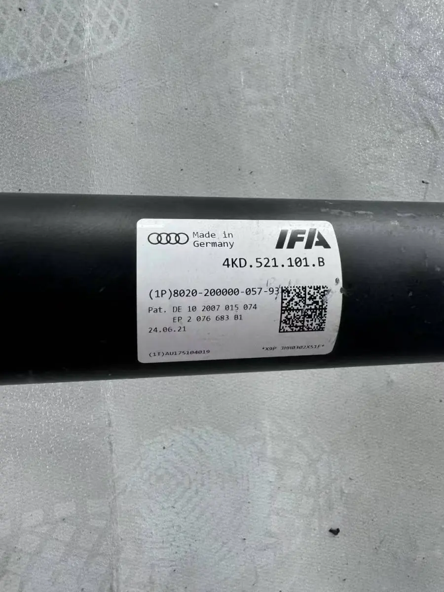 Part number label reading 4KD.521.101.B printed on a drive shaft tube