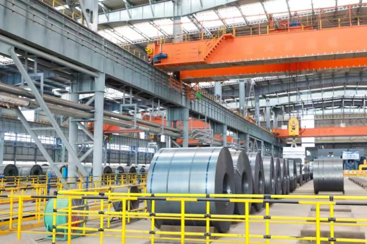 Steel coil stock held in a rolling mill warehouse
