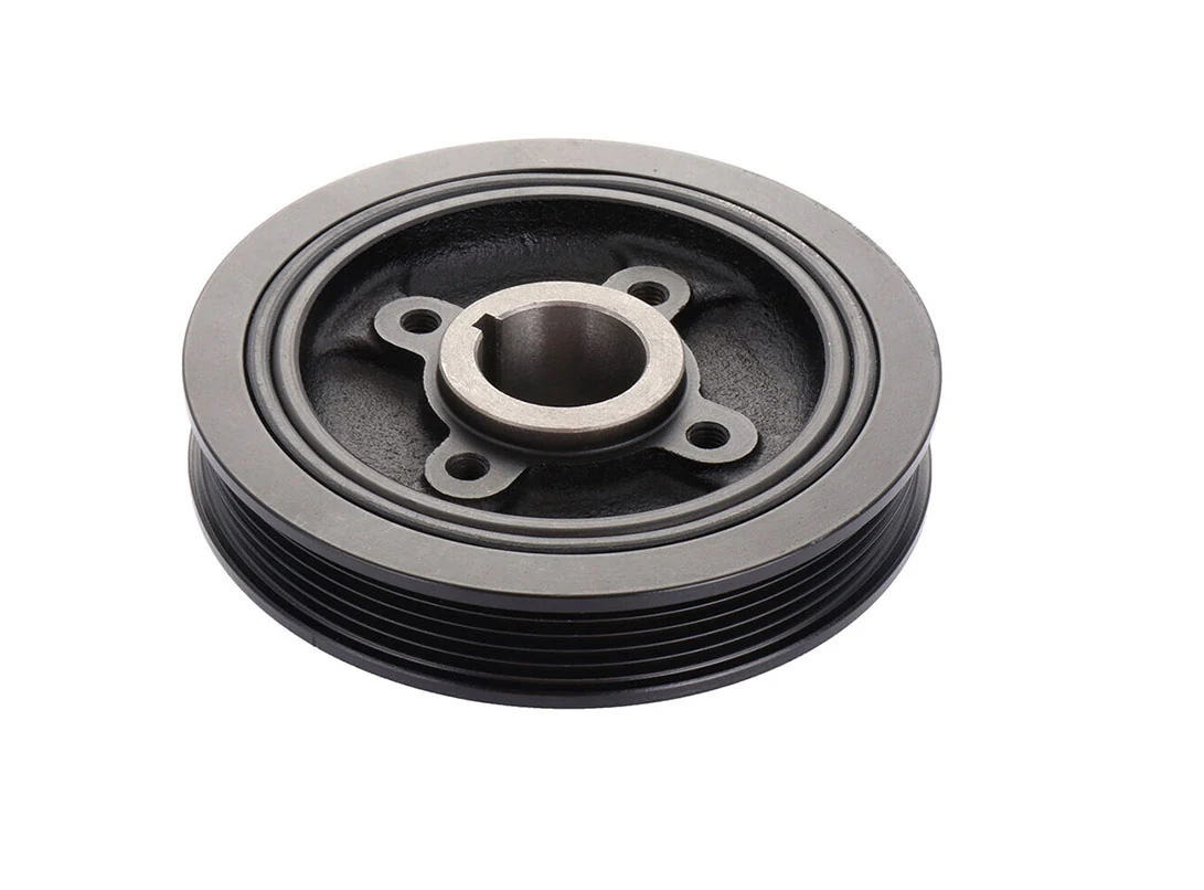 Crankshaft pulley showing the mounting flange and bolt holes