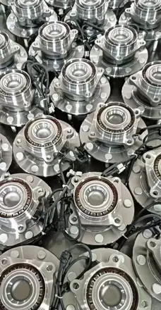 Batch of finished wheel hub unit assemblies stacked after inspection