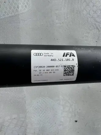Part number label reading 4KD.521.101.B printed on a drive shaft tube