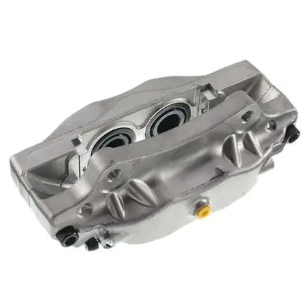 Machined brake caliper body showing the piston bores and pad abutments