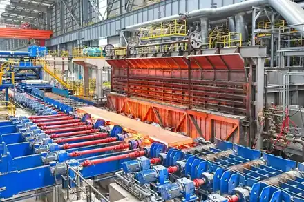 Long production line with material handling and machining stations