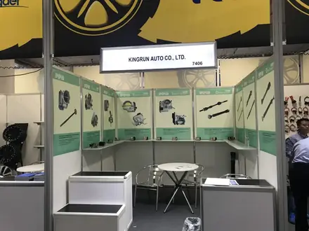 Kingrun Auto Co Ltd exhibition stand with parts displayed on wall panels