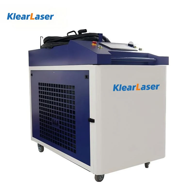 Cabinet CW machine with handheld cleaning head resting on top
