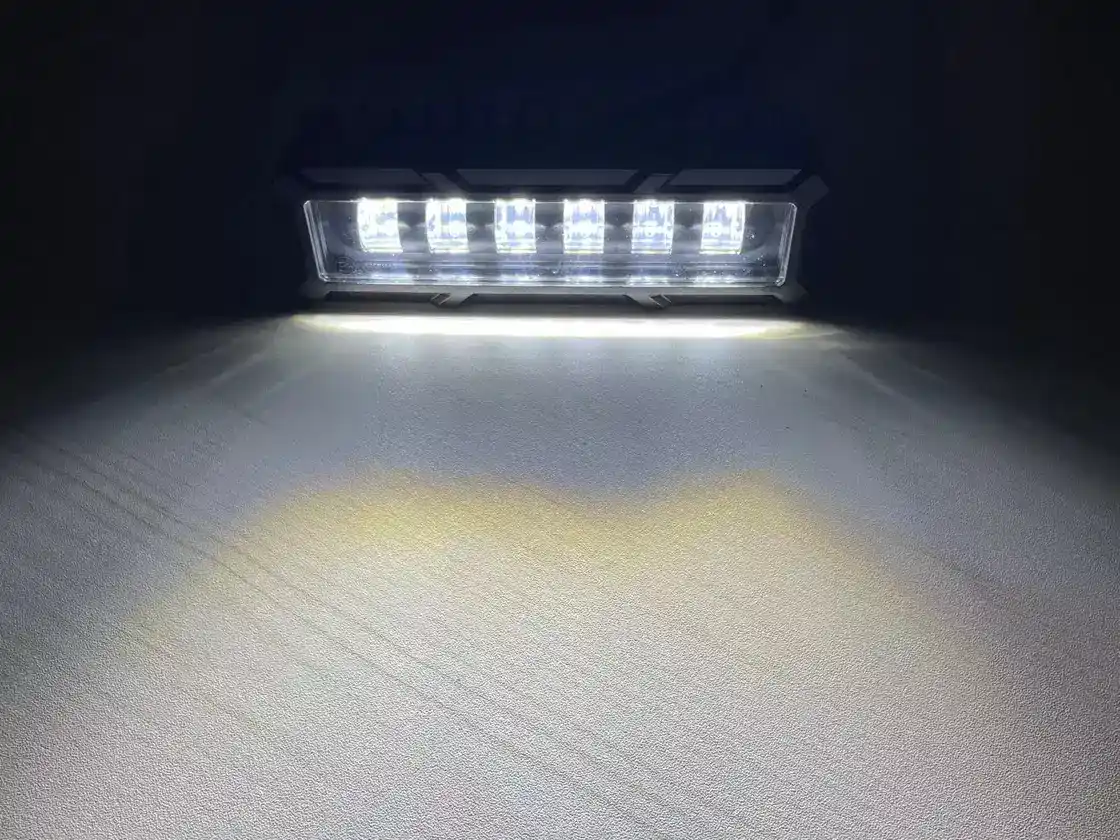 KOWK102 light in a vehicle front end assembly