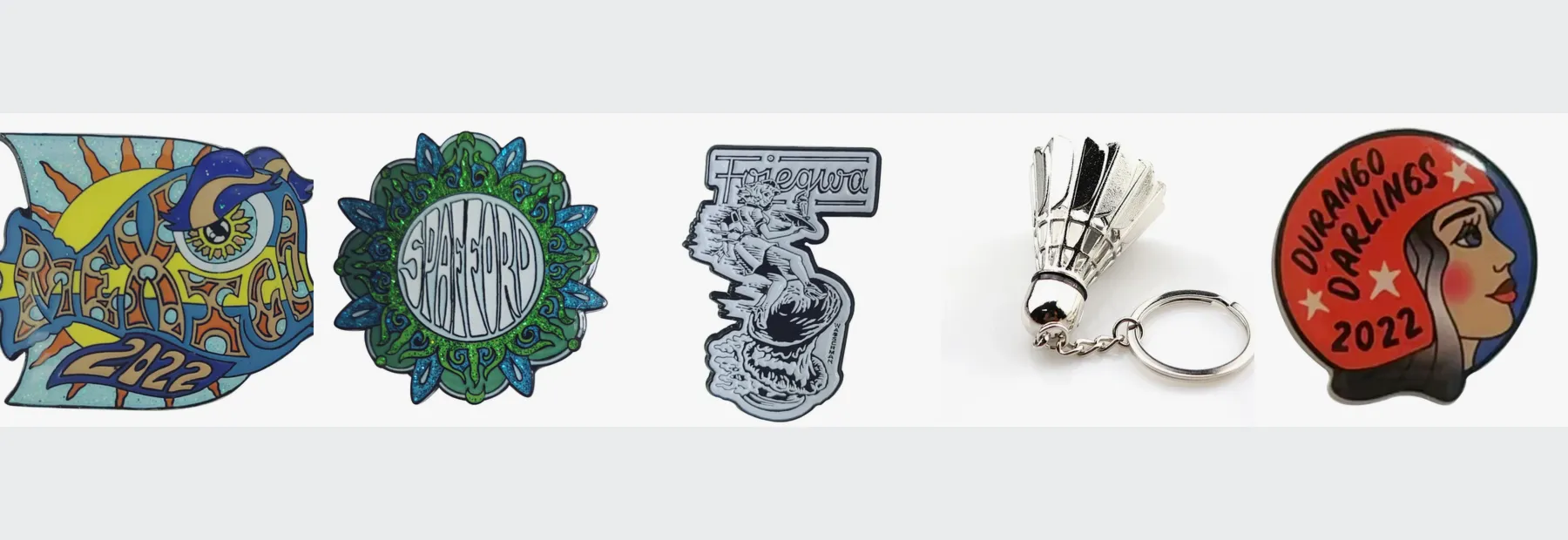 Pins and badges of the kind used for sports clubs and events