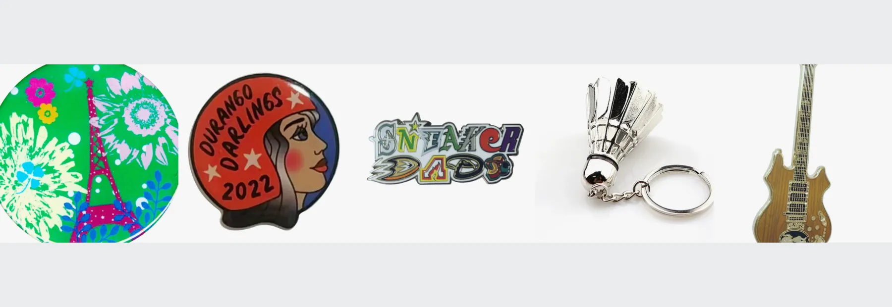 Pins and badges of the kind used for trade shows and conferences