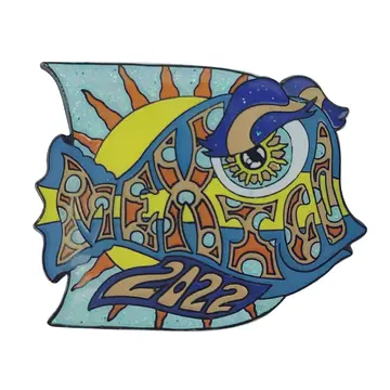 Glitter enamel fish pin in blue orange and purple with a sun motif