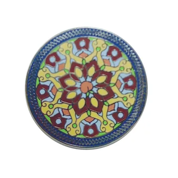 Round hard enamel medallion pin with a blue and yellow mandala pattern