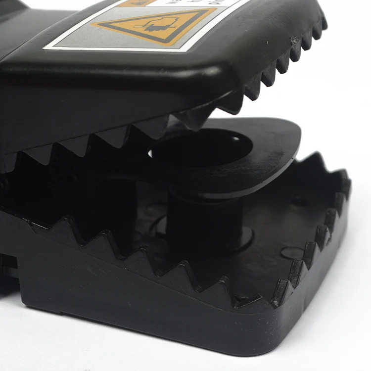 Plastic Mouse Snap Trap - NRTP003, in use