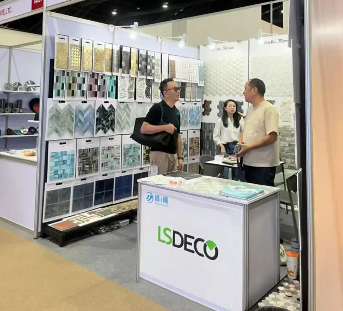 LSDECO branded exhibition stand hung with mosaic sample boards