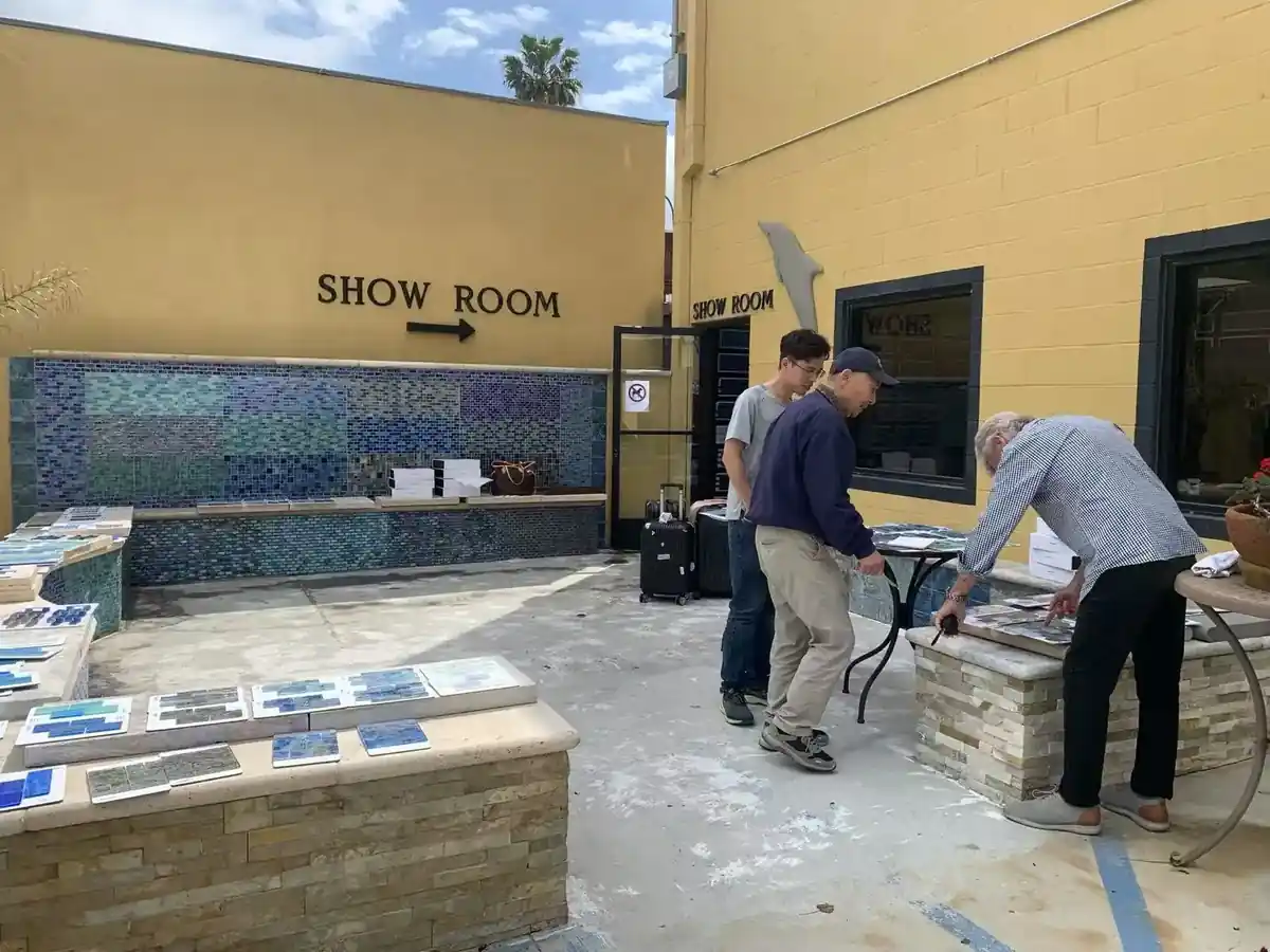 Entrance to the LSDECO showroom in Foshan with a pool mosaic display panel