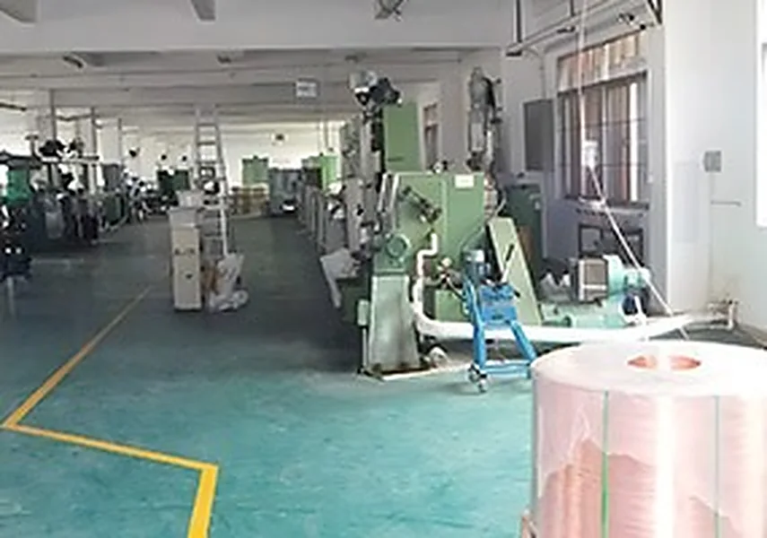 Wide view of the LANP CABLE workshop showing multiple parallel production lines