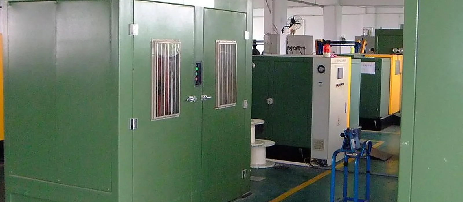 LANP CABLE production hall with enclosed twisting lines and control cabinets