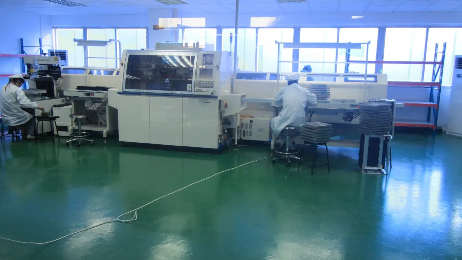 SMT line placing LED boards at the Lantsun electronics workshop