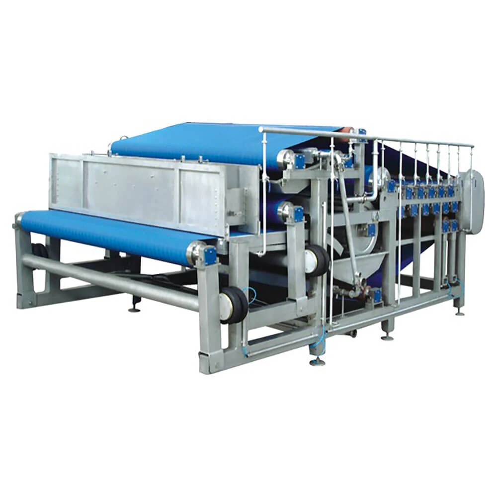 Apple belt press extracting juice on a fruit processing line