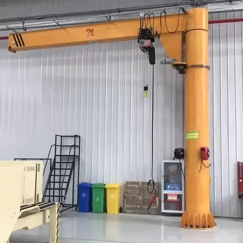 Two ton mobile trackless pillar jib crane on a shop floor