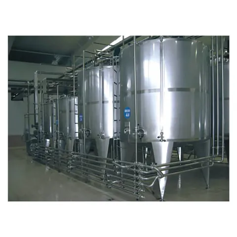 Stainless steel blending tank with agitator drive mounted on the top head