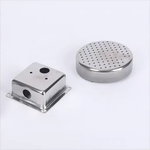 Deep drawn stamped components arranged for inspection