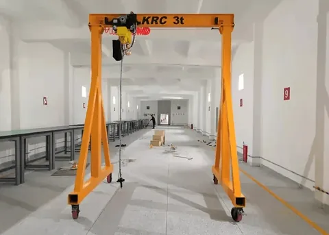 Three ton mobile gantry crane standing on a workshop floor