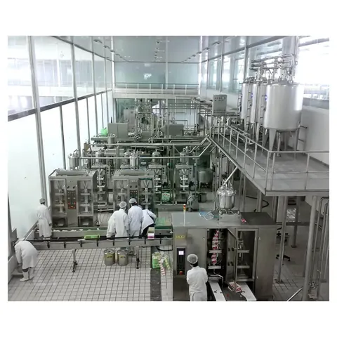 Plastic pouch filling machine forming and sealing milk pouches from film