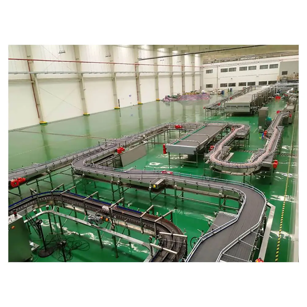 Conveyer line in stainless steel carrying packaged bottles through a beverage plant
