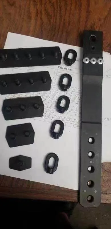 Custom moulded plastic parts arranged for inspection