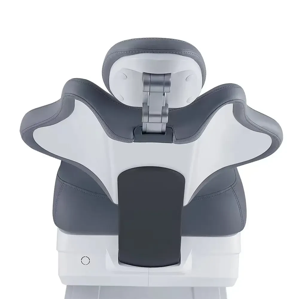 Grey dental chair shown with its unit parts