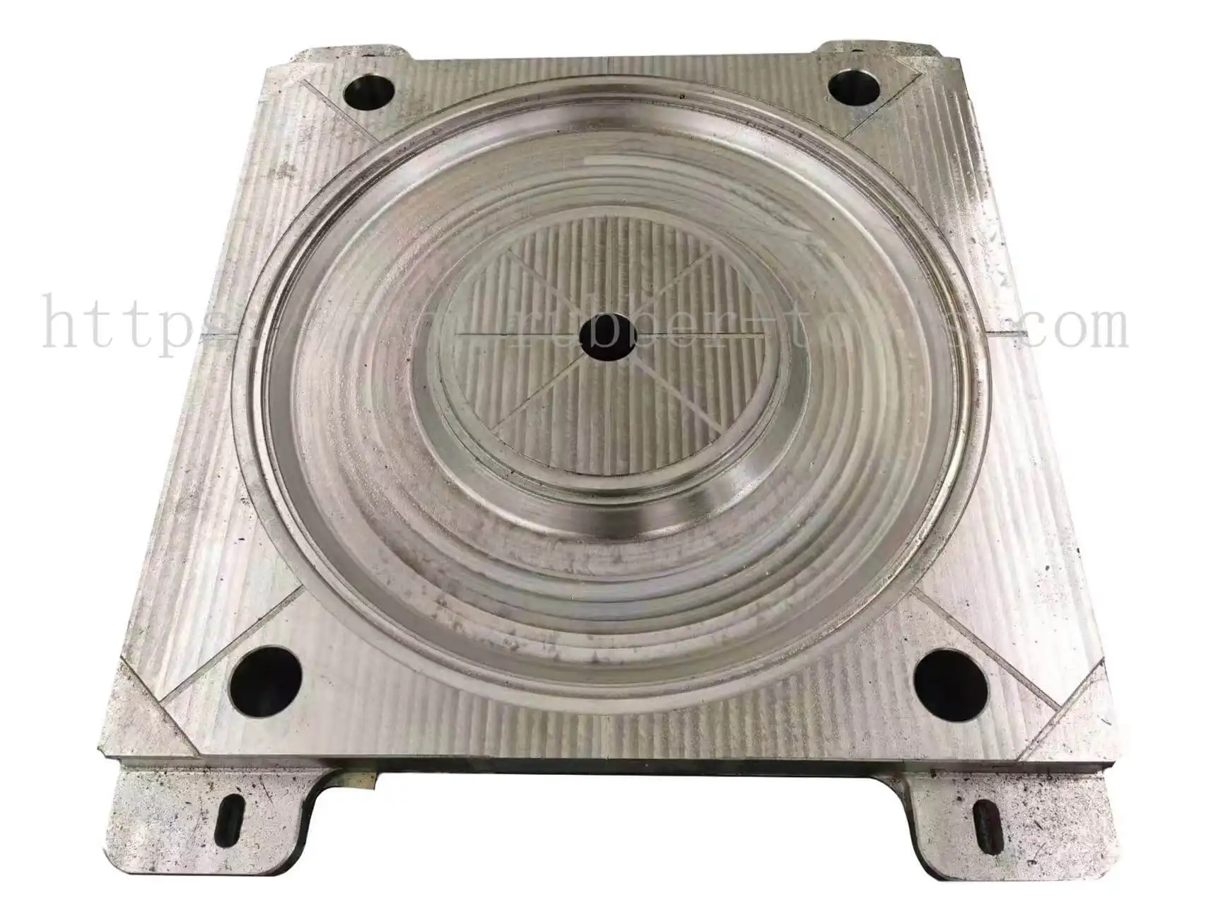 Machined rubber mold half showing the cavity detail