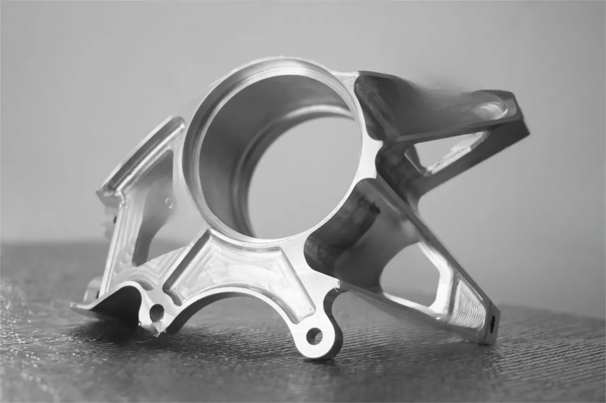 Machined aluminium suspension component