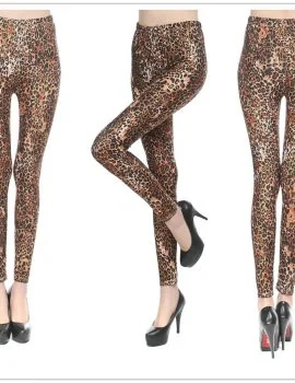 Black leather-effect legging shown full length on a model, highlighting the textured surface and stretch fit