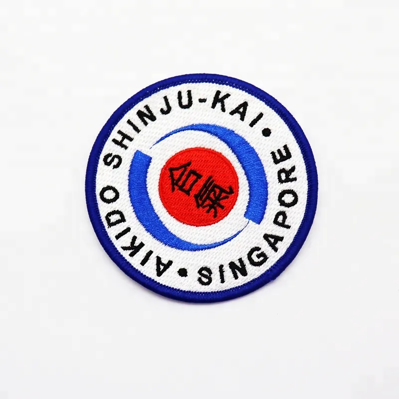 Custom Merrow-Border Patches For A Uniform Program