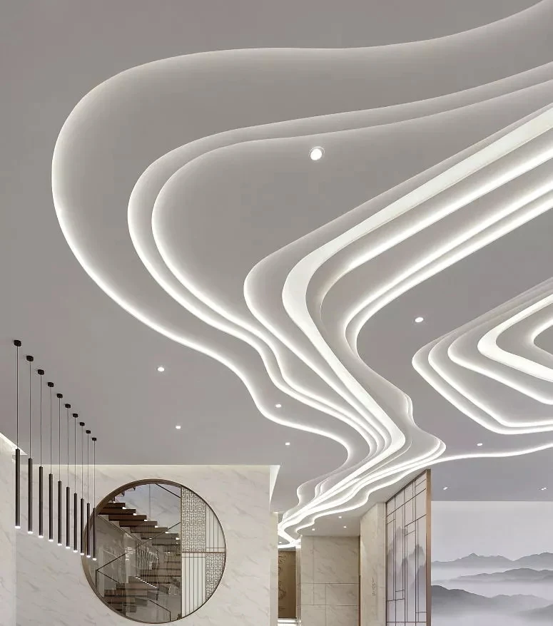 Sculpted ceiling feature formed from curved illuminated LED neon lines