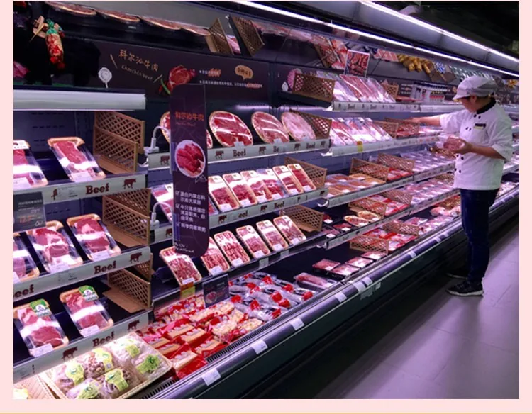 Open fronted chilled meat display case lit with LED cooler modules
