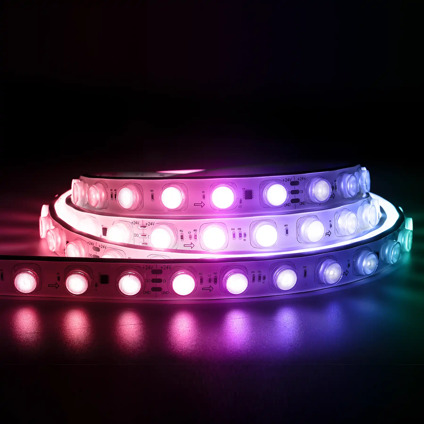Coiled addressable RGB LED strip lit in multiple colours