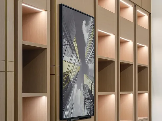 Built in display shelving lit with warm white LED strip lighting